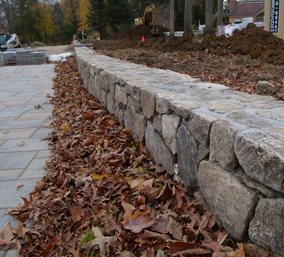 Retaining wall with leaves